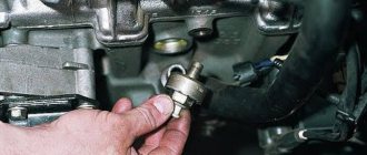 Chevrolet Niva knock sensor: where is it located, replacement