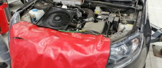 Lada Granta with open hood